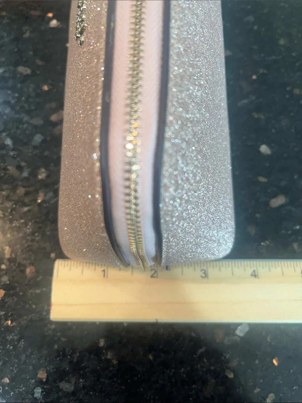 Kate Spade glittery rose gold cosmetic pouch